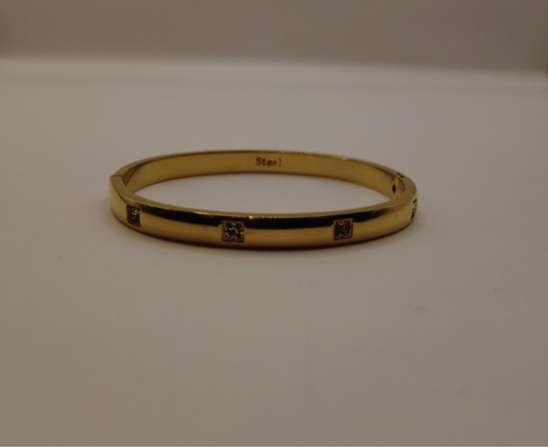 Goudkleurige Bangle Armband met Zirconia Steentjes