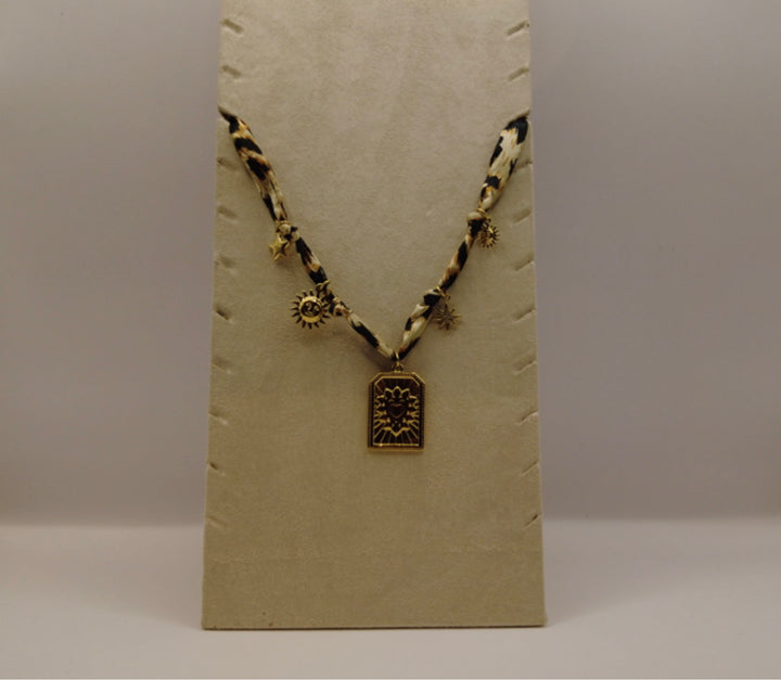 Stainless Steel Ketting – Zonnebedel & Sterren aan Panterprint Band