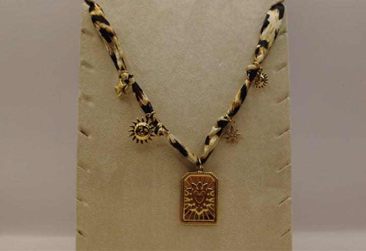 Stainless Steel Ketting – Zonnebedel & Sterren aan Panterprint Band